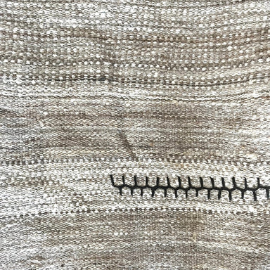 Wool Rug in Natural White, Grey, Brown, and Beige Melange in a Striped Pattern with Black Stitching Details 7.8' x 5.3' - Homebody Denver
