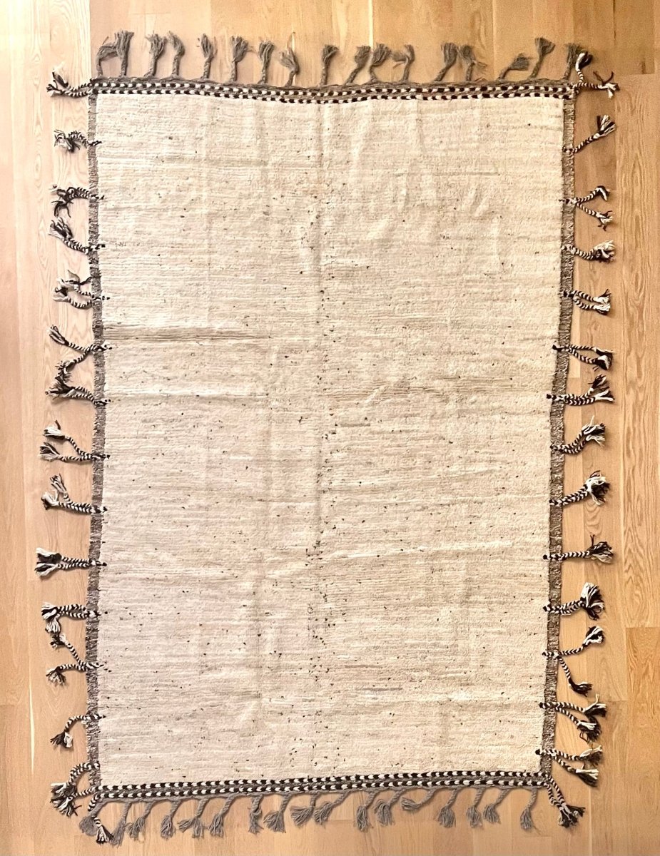Wool Rug, Natural White with Dark Brown Flecks, Brown and White Border and Braided Tassels 7.2' x 9.9' - Homebody Denver