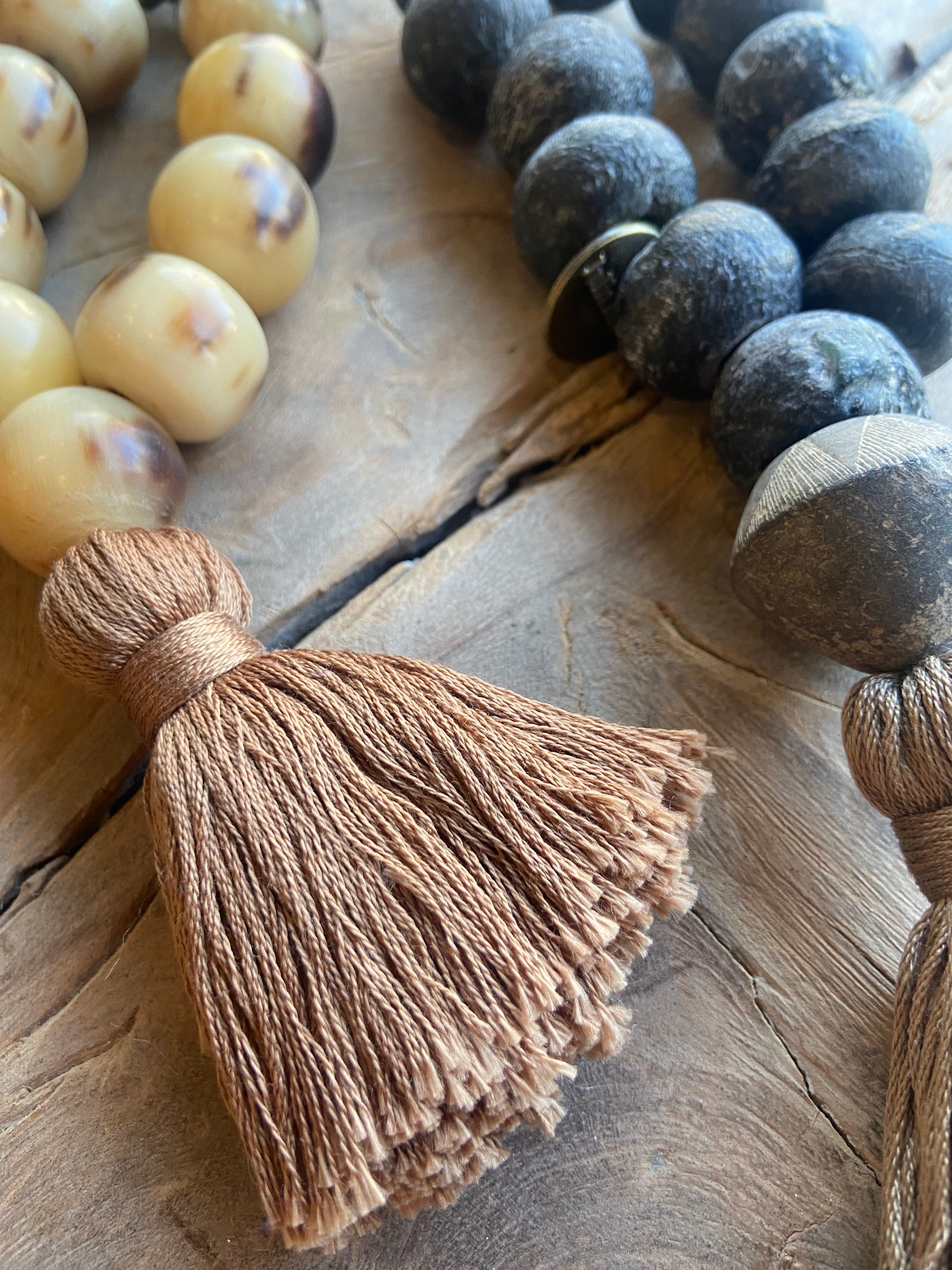 Small Horn Beaded Sculpture with Brown Tassel and Brass Bell