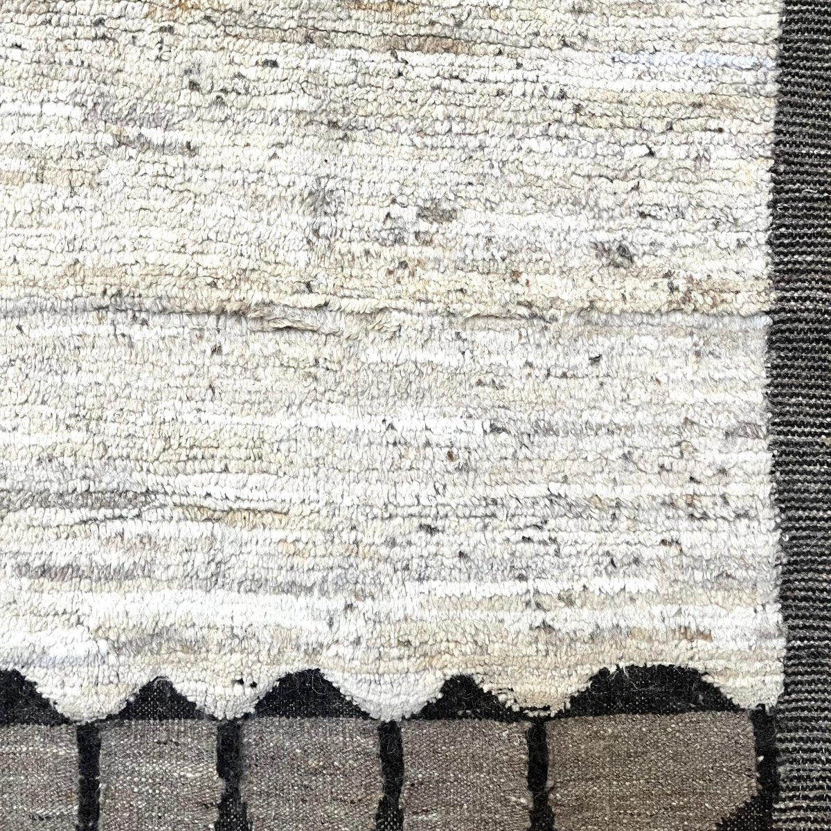 Wool Rug in Natural White with Light and Dark Brown Border/ Long Side Border Stripes/Short Side Border Triangles 6.9' x 9.3' - Homebody Denver